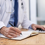 Doctor writing