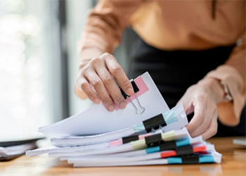 Person handling documents